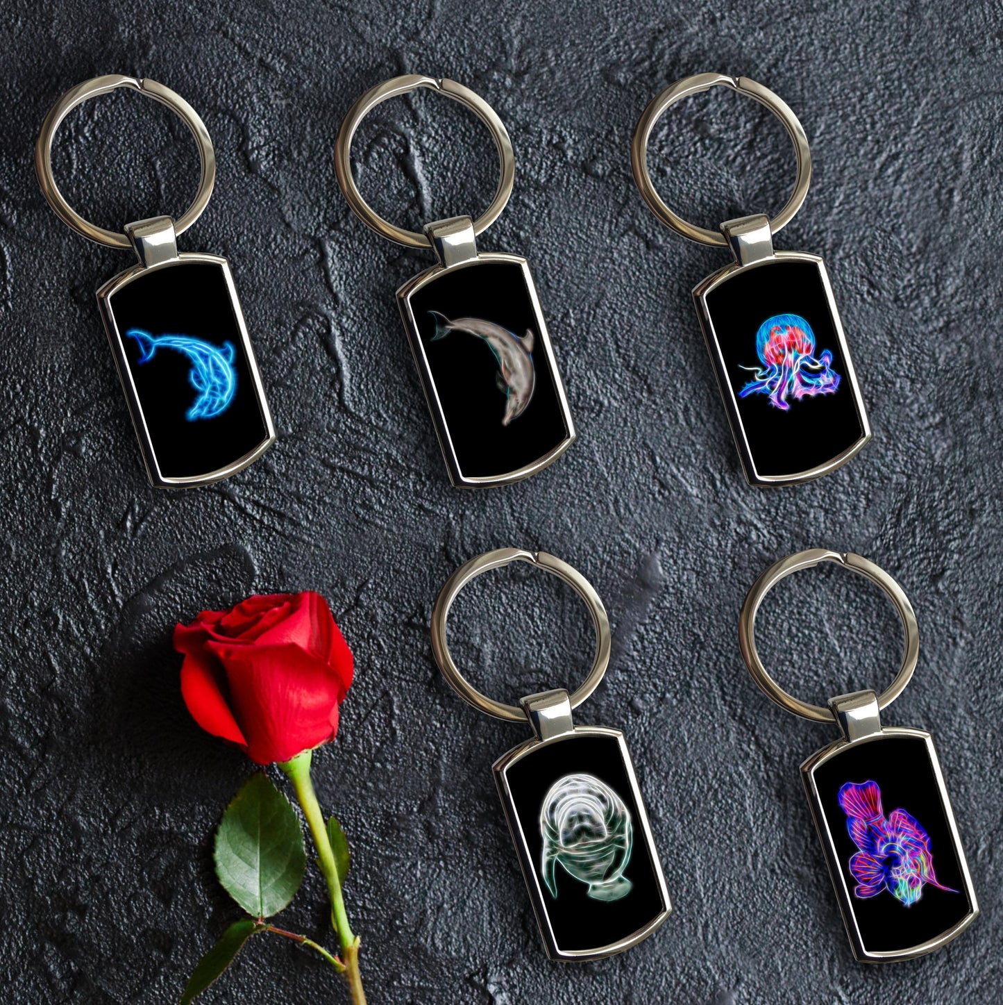 Marine Life Metal Rectangle Keyring. Designs include Dolphin, Jellyfish, Mandarin Dragonet, and Manatee